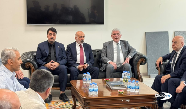 Müsavat Dervişoğlu DTSO'yu ziyaret etti